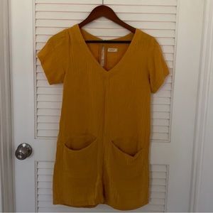 Mustard yellow muslin romper brand of one sea